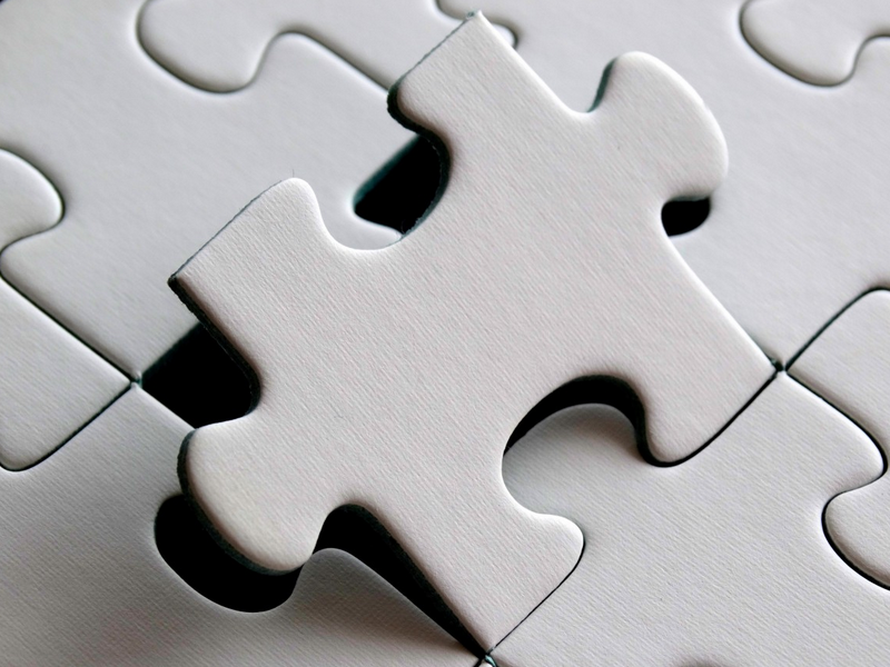 Puzzle Piece fitting a puzzle